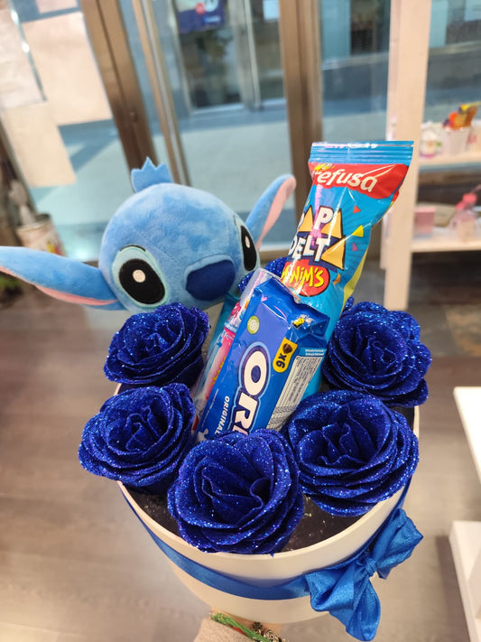 Caja de rosas con peluche